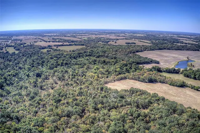a view of a barn with a yard
