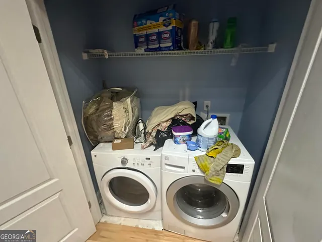 a utility room with dryer and washer
