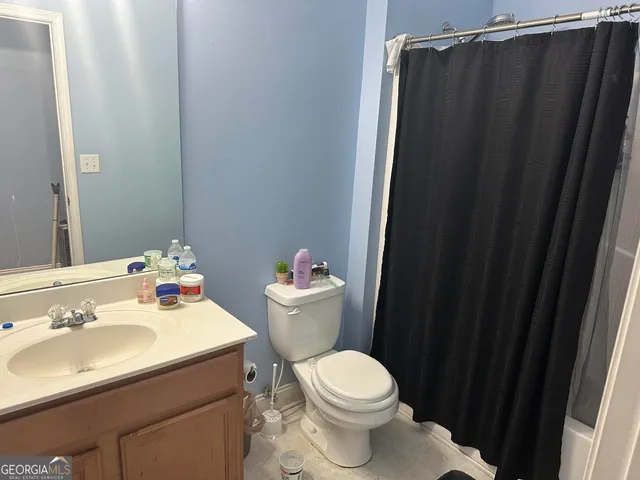 a bathroom with a sink and a toilet