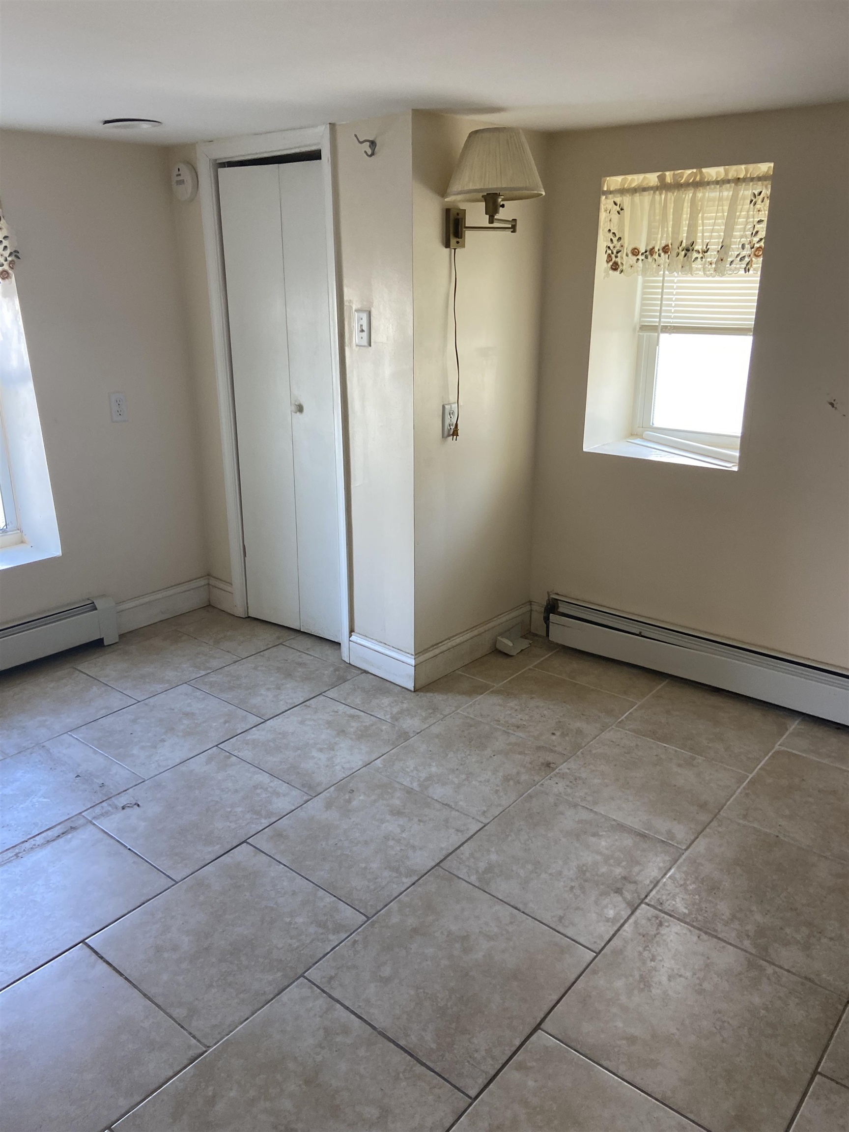 611 East 7th Street Ocean City, NJ 08226 - Photo 8 of 27 a view of an empty room with a window