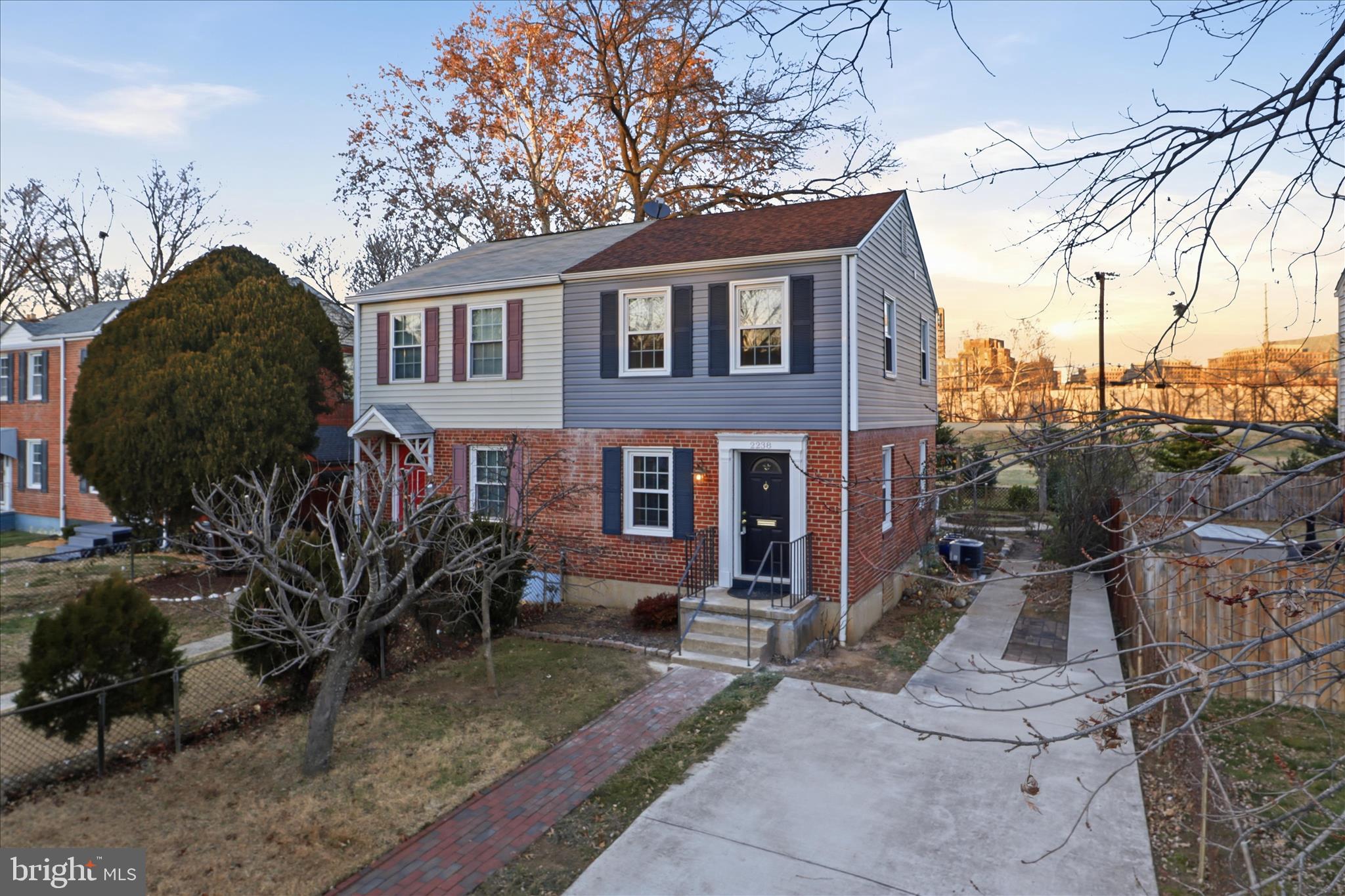 2238 Arlington Terrace Alexandria, VA 22303 - Photo 1 of 37 a front view of a house with garden