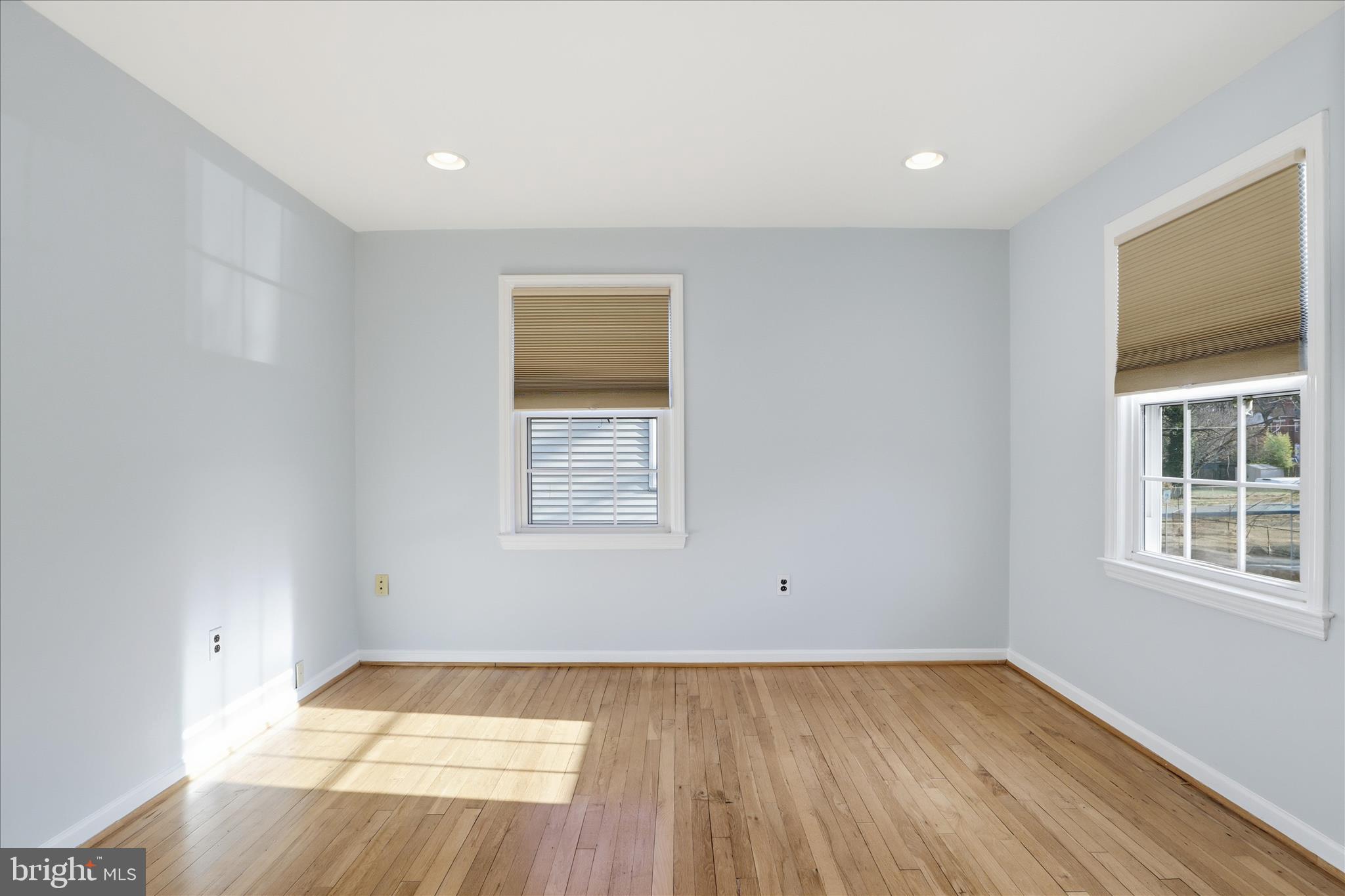2238 Arlington Terrace Alexandria, VA 22303 - Photo 15 of 37 an empty room with wooden floor and windows