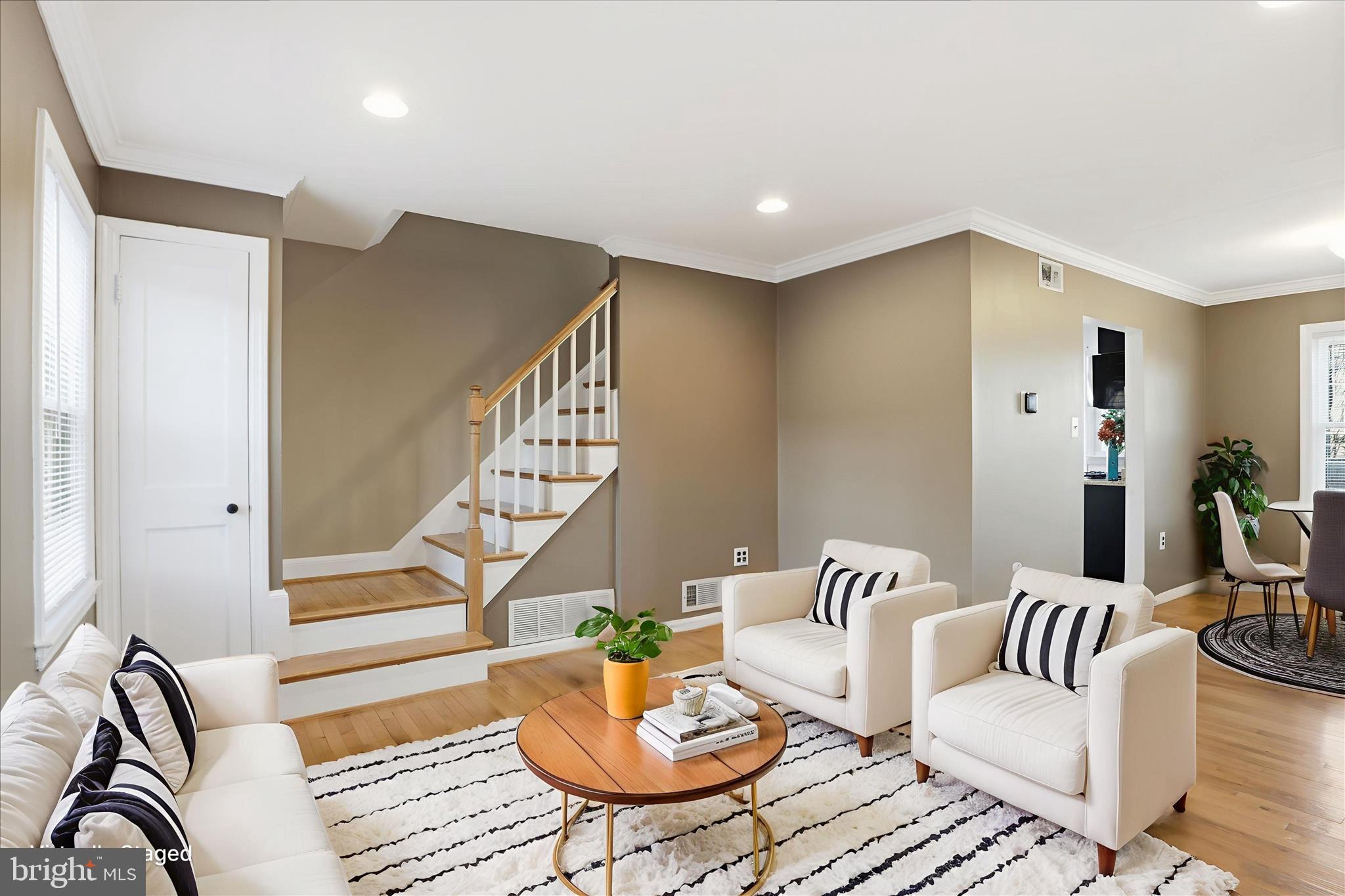 2238 Arlington Terrace Alexandria, VA 22303 - Photo 2 of 37 a living room with furniture and a dining room