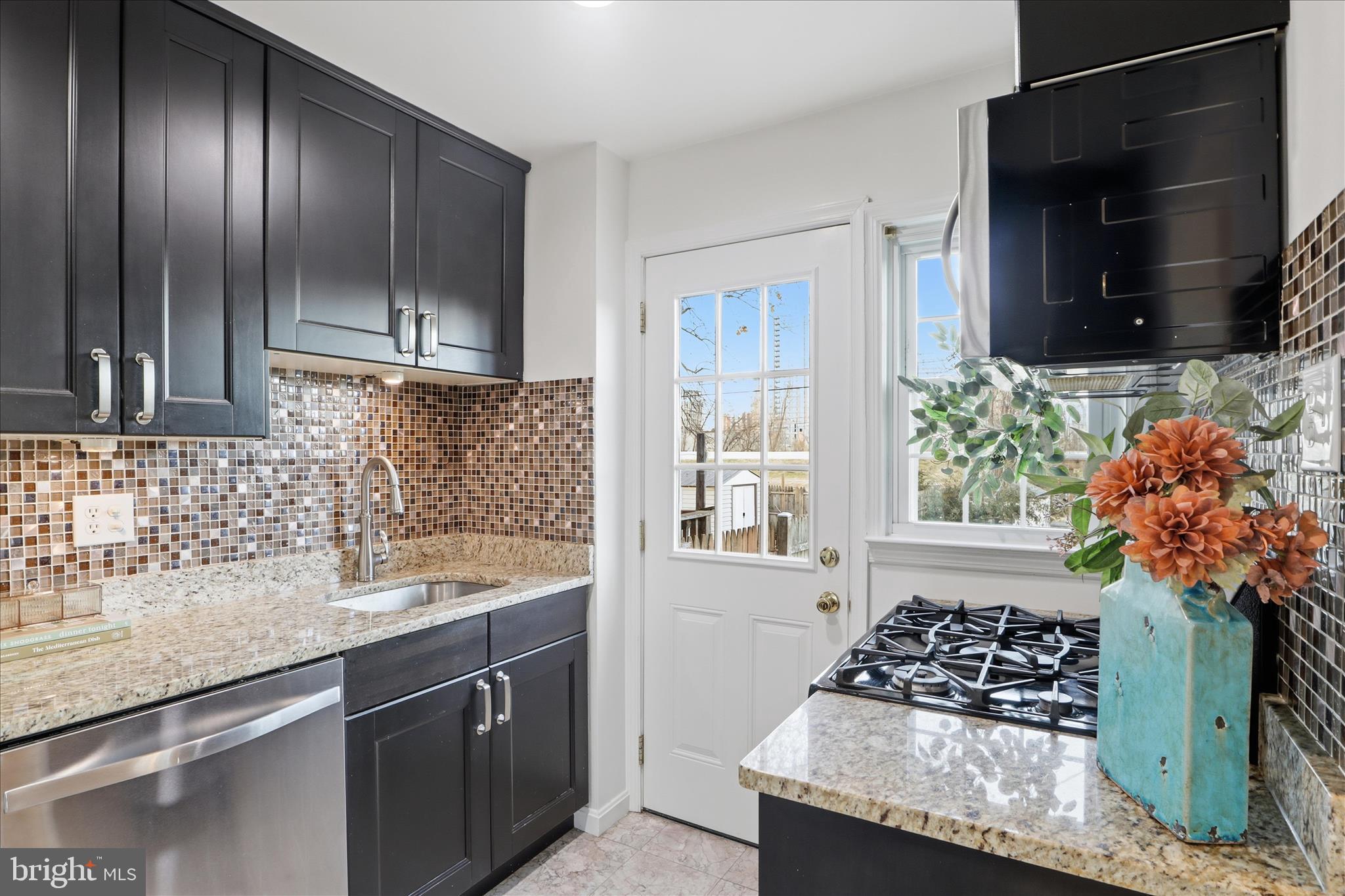 2238 Arlington Terrace Alexandria, VA 22303 - Photo 3 of 37 a kitchen with stainless steel appliances granite countertop a sink stove and refrigerator