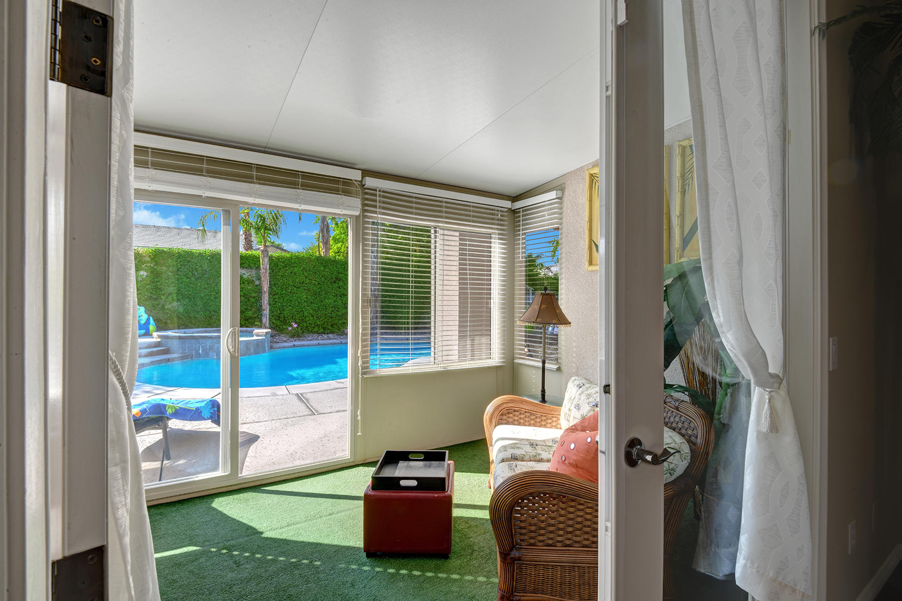 19 Orleans Road Rancho Mirage, CA 92270 - Photo 18 of 32 PRIMARY BEDROOM TO SUNROOM AND POOL MLS