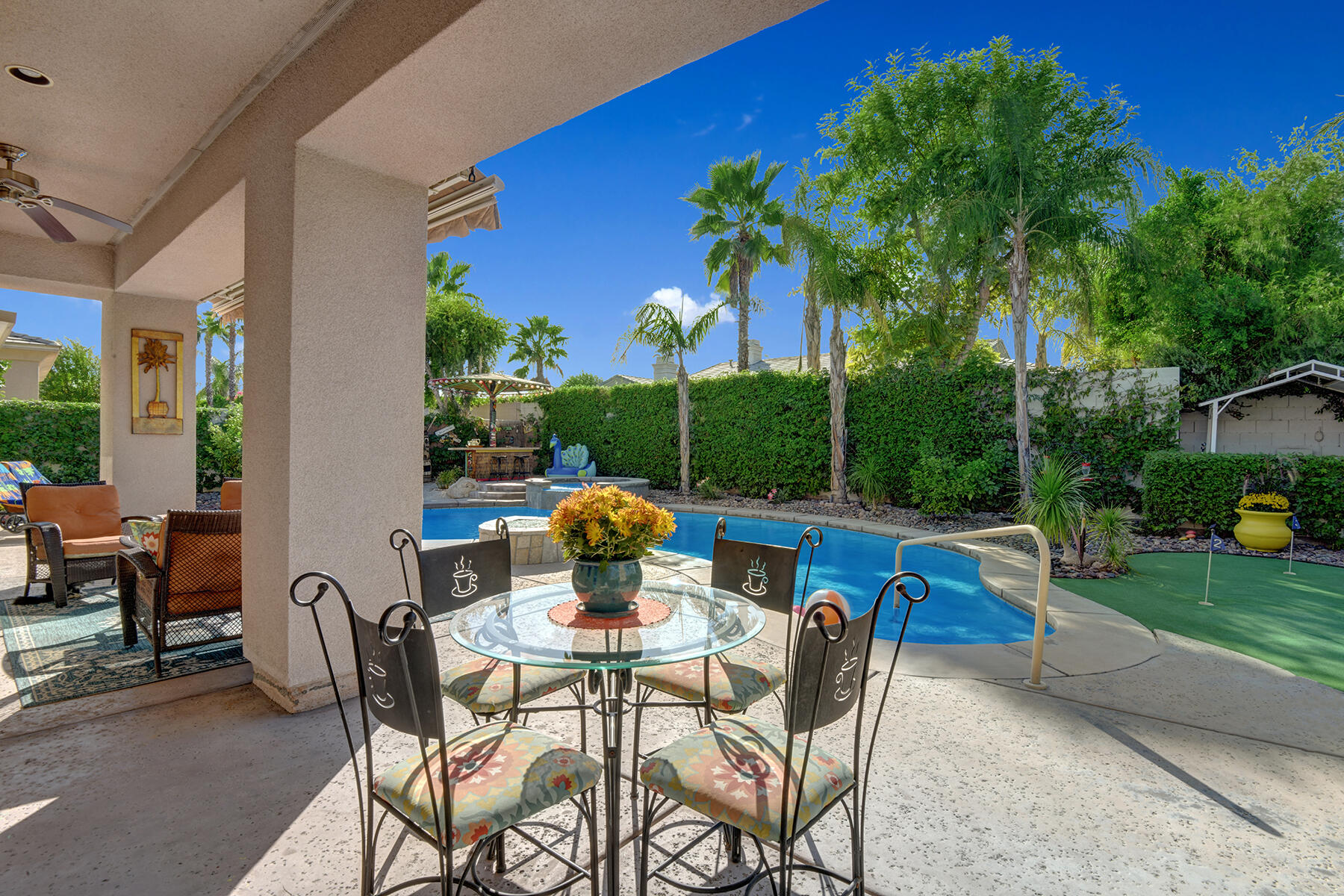 19 Orleans Road Rancho Mirage, CA 92270 - Photo 27 of 32 BACK COVERED POOL SIDE DINING MLS