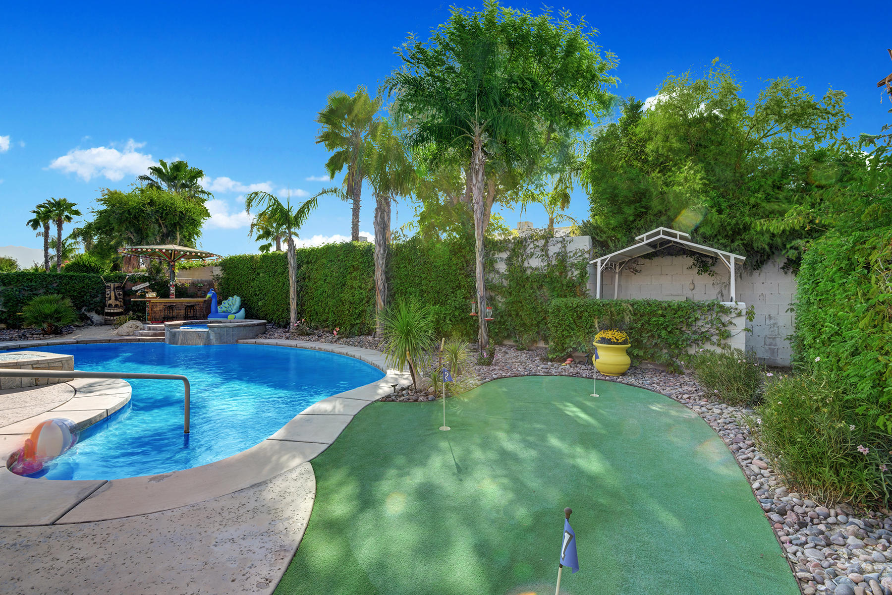 19 Orleans Road Rancho Mirage, CA 92270 - Photo 29 of 32 PUTTING GREEN TO POOL AND SPA MLS