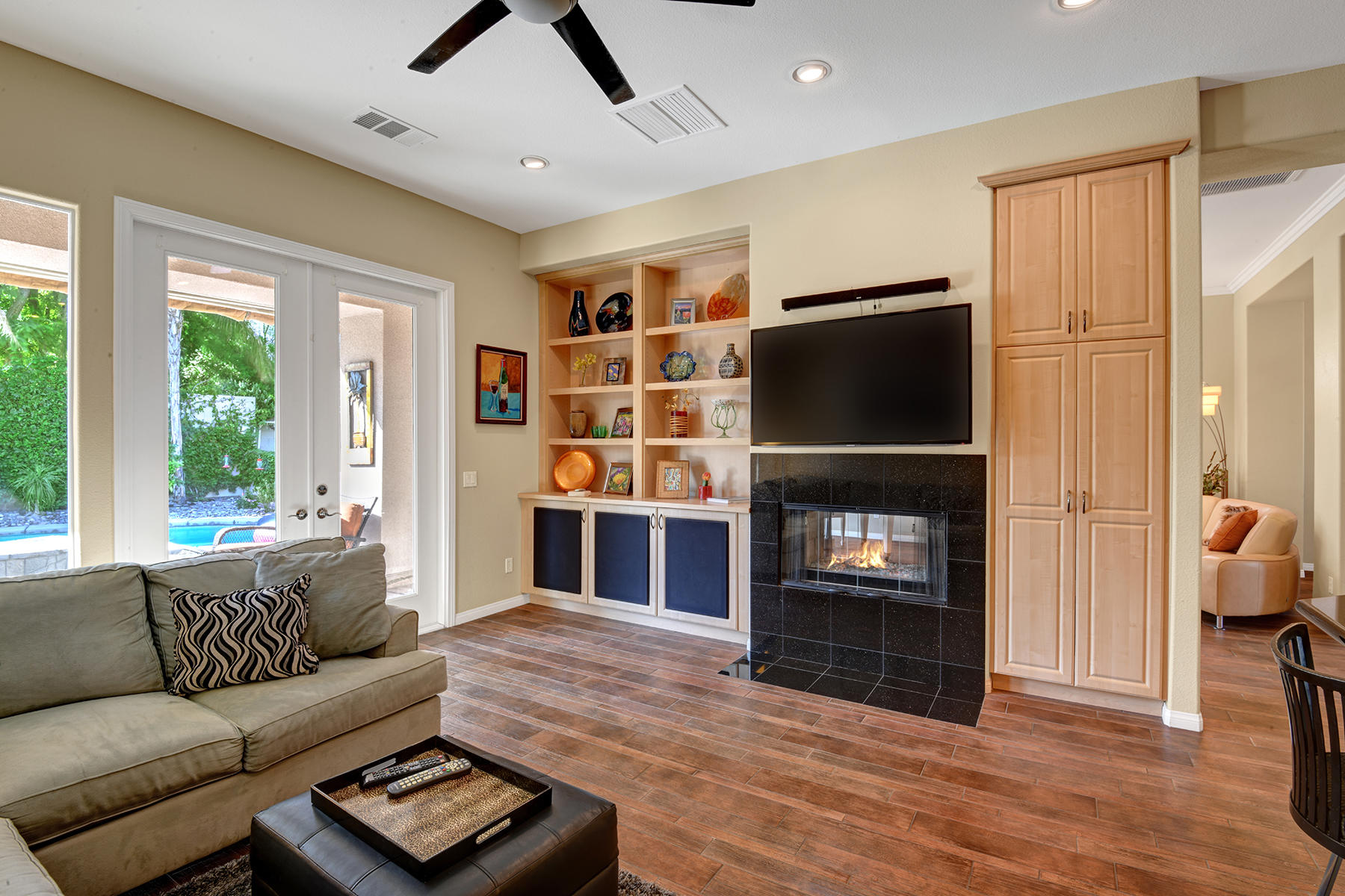 19 Orleans Road Rancho Mirage, CA 92270 - Photo 6 of 32 FAMILY ROOM ANGLED TO POOL YARD WITH FIR