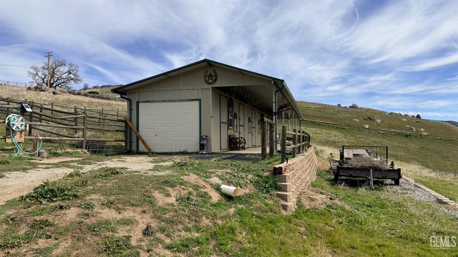Undisclosed Address Tehachapi, CA 93561 - Photo 3 of 5 a backyard of a house with table and chairs