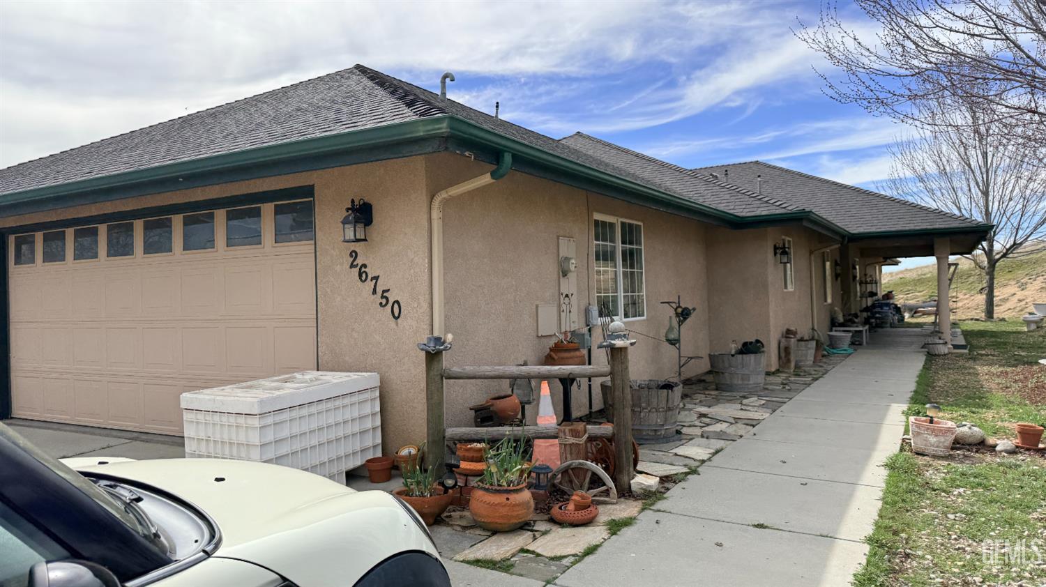 Undisclosed Address Tehachapi, CA 93561 - Photo 4 of 5 a backyard of a house with outdoor seating