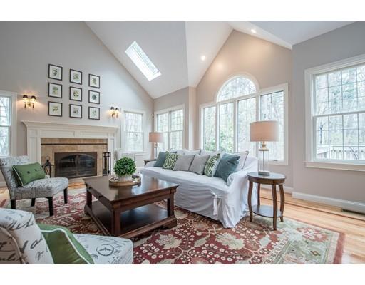 133 Green Road Bolton, MA 01740 - Photo 14 of 30 a living room with furniture a fireplace and a large window