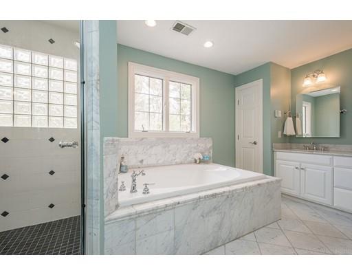 133 Green Road Bolton, MA 01740 - Photo 20 of 30 a bathroom with a sink vanity granite tub and a mirror