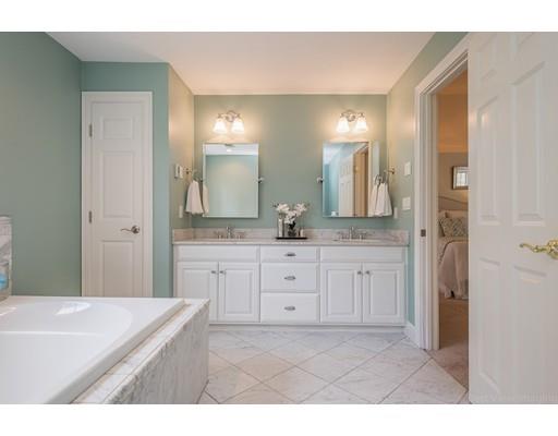 133 Green Road Bolton, MA 01740 - Photo 21 of 30 a bathroom with a granite countertop sink mirror and a bathtub