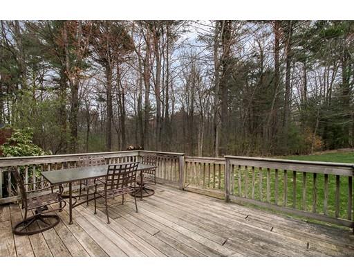 133 Green Road Bolton, MA 01740 - Photo 26 of 30 a view of a wooden deck with a bench