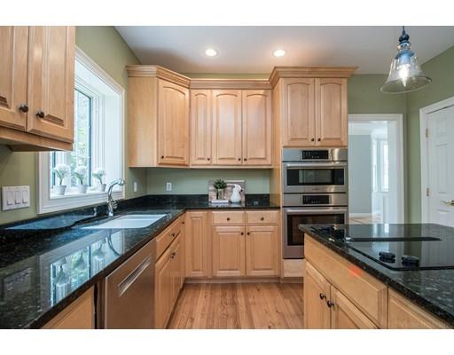 133 Green Road Bolton, MA 01740 - Photo 9 of 30 a kitchen with stainless steel appliances granite countertop a sink a stove and cabinets