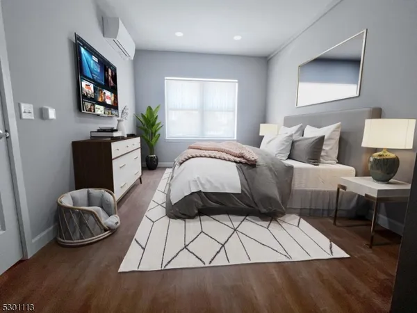 a bed room with a bed and a couch