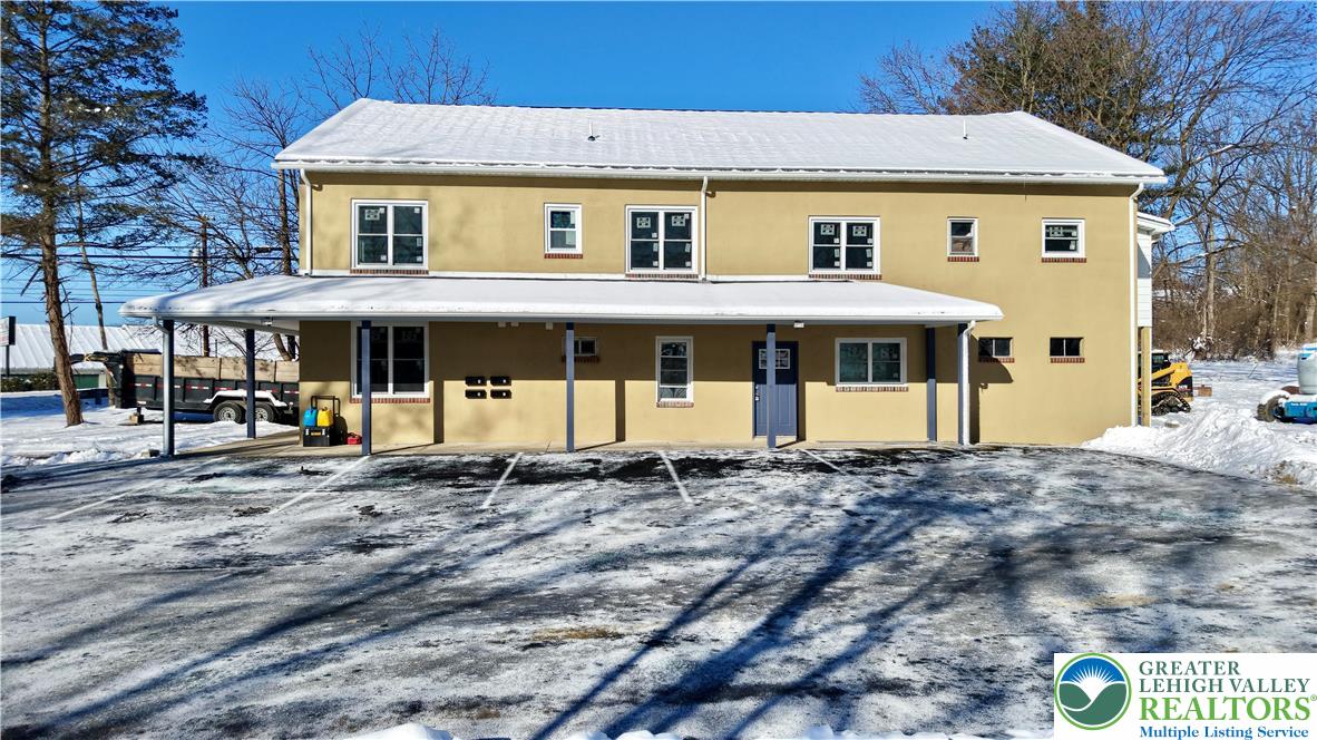 403 North Walnut Street, Unit D Bath, PA 18014 - Photo 17 of 17 a front view of a house with a porch