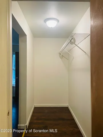 a view of small space with wooden floor