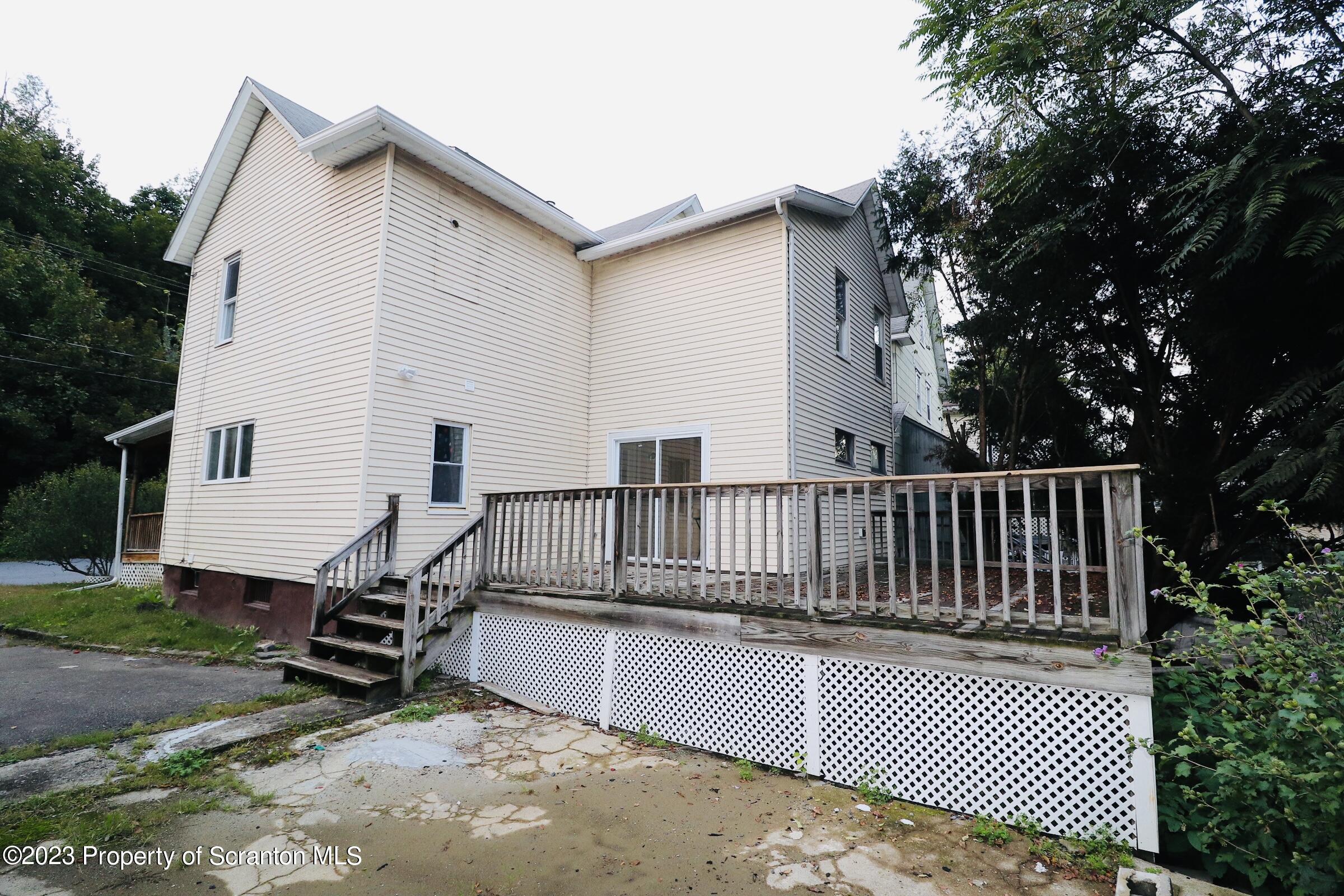 2308 Pond Avenue Scranton, PA 18508 - Photo 6 of 26 a view of backyard with deck and outdoor seating