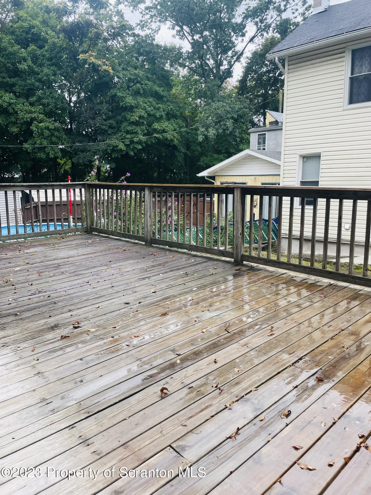 2308 Pond Avenue Scranton, PA 18508 - Photo 7 of 26 a front view of a house with a wooden floor