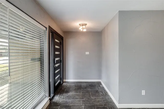 a view of hallway with walk in closet