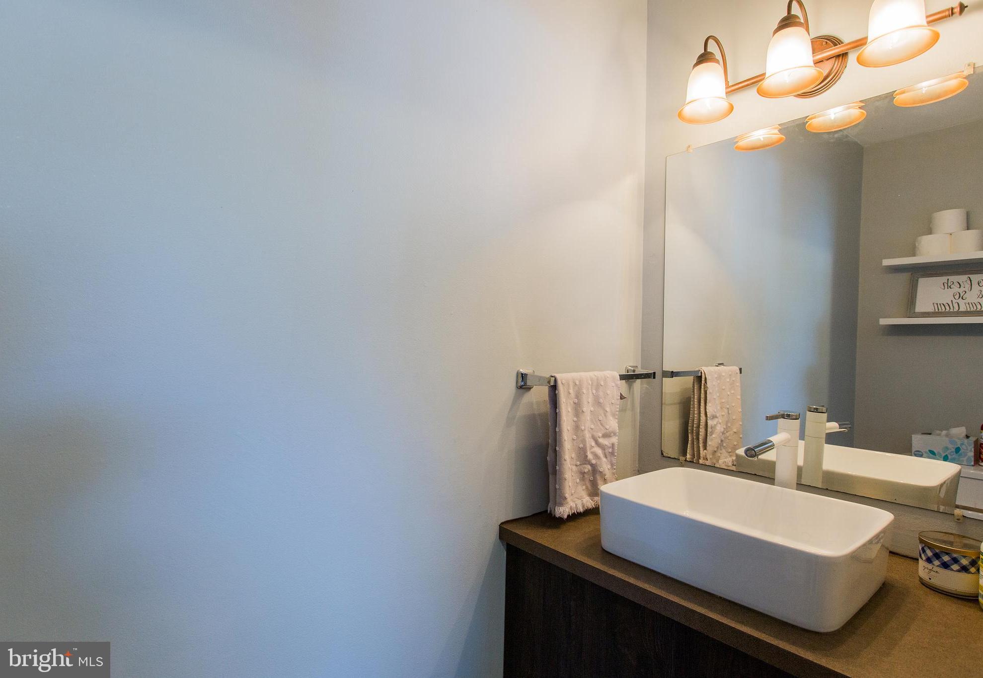 107 Chukar Court Lititz, PA 17543 - Photo 16 of 47 powder room just off the kitchen