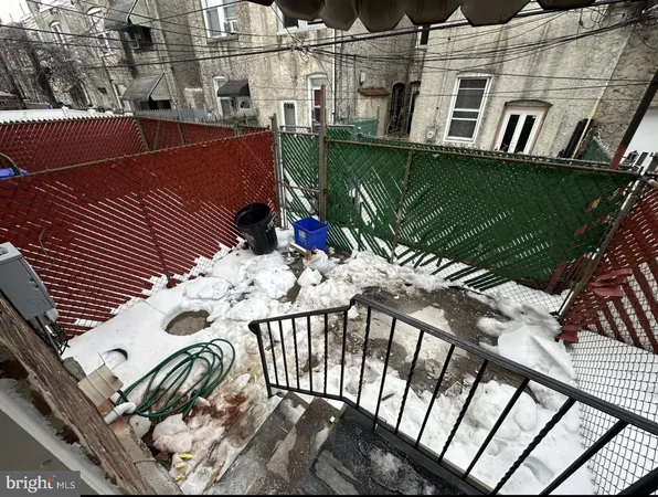 a view of street from balcony