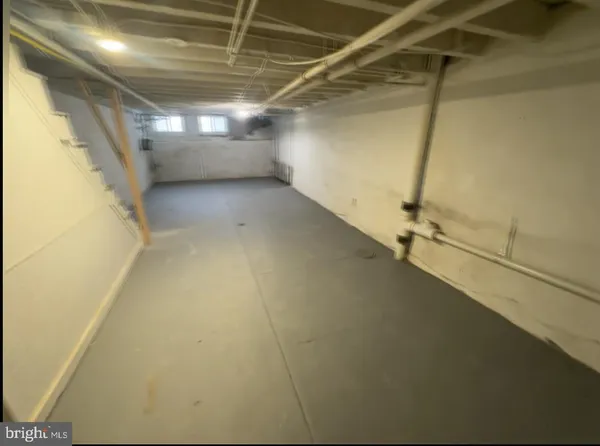 a view of empty room with windows