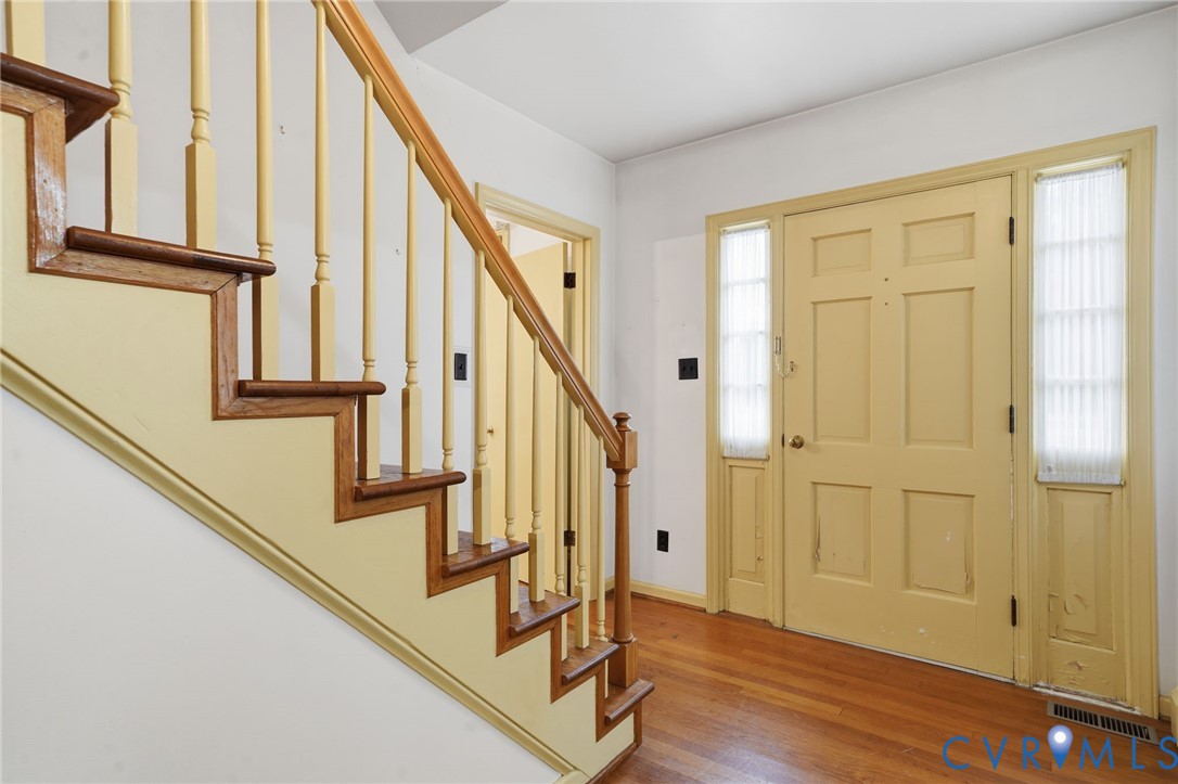 6726 Newtown Road St. Stephens Church, VA 23148 - Photo 12 of 50 a view of an entryway with wooden floor and door