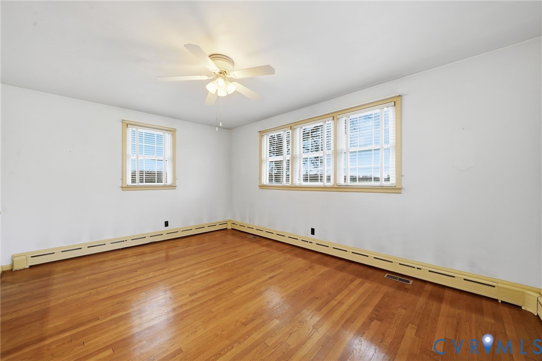 6726 Newtown Road St. Stephens Church, VA 23148 - Photo 20 of 50 a view of a room with wooden floor and a window