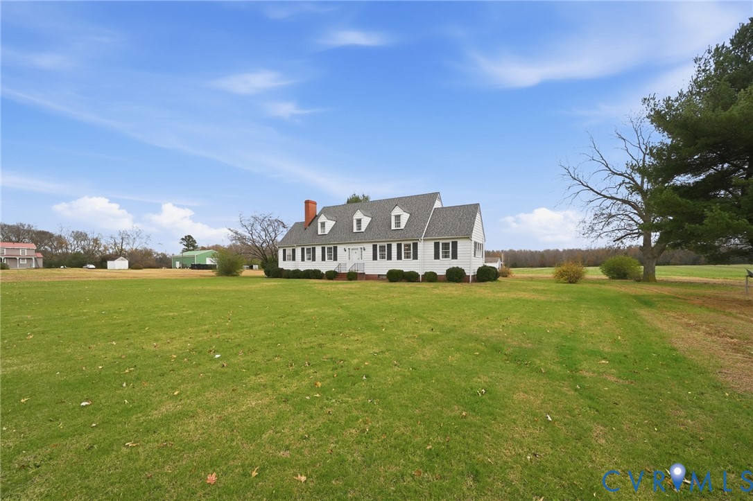 6726 Newtown Road St. Stephens Church, VA 23148 - Photo 4 of 50 a view of a house with a big yard