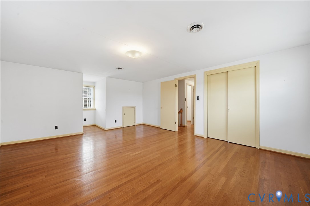 6726 Newtown Road St. Stephens Church, VA 23148 - Photo 41 of 50 a view of an empty room and wooden floor and closet