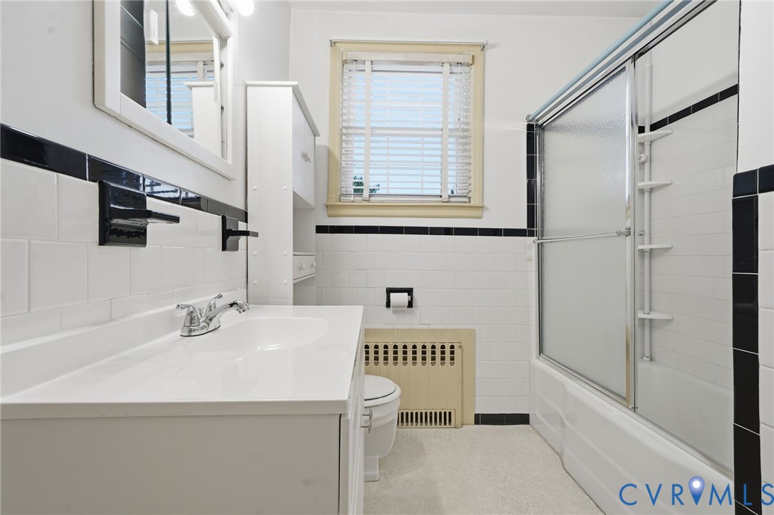 6726 Newtown Road St. Stephens Church, VA 23148 - Photo 44 of 50 a bathroom with a sink a toilet and a shower