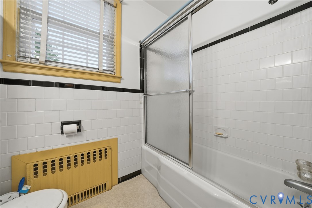 6726 Newtown Road St. Stephens Church, VA 23148 - Photo 46 of 50 a bathroom with a bathtub and a shower