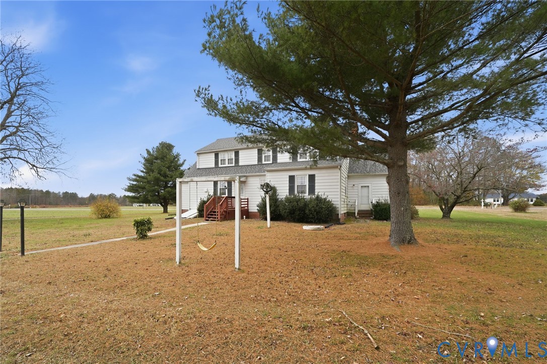 6726 Newtown Road St. Stephens Church, VA 23148 - Photo 7 of 50 a view of a house with a yard