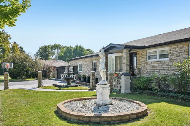 a view of a house with backyard porch and sitting area