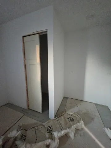 an empty room with windows