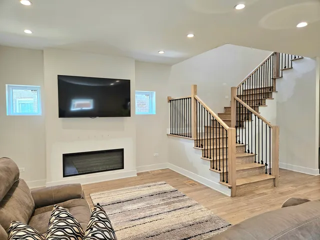 a view of livingroom with furniture and flat screen tv