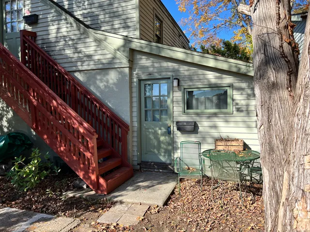 a view of a porch with a bench