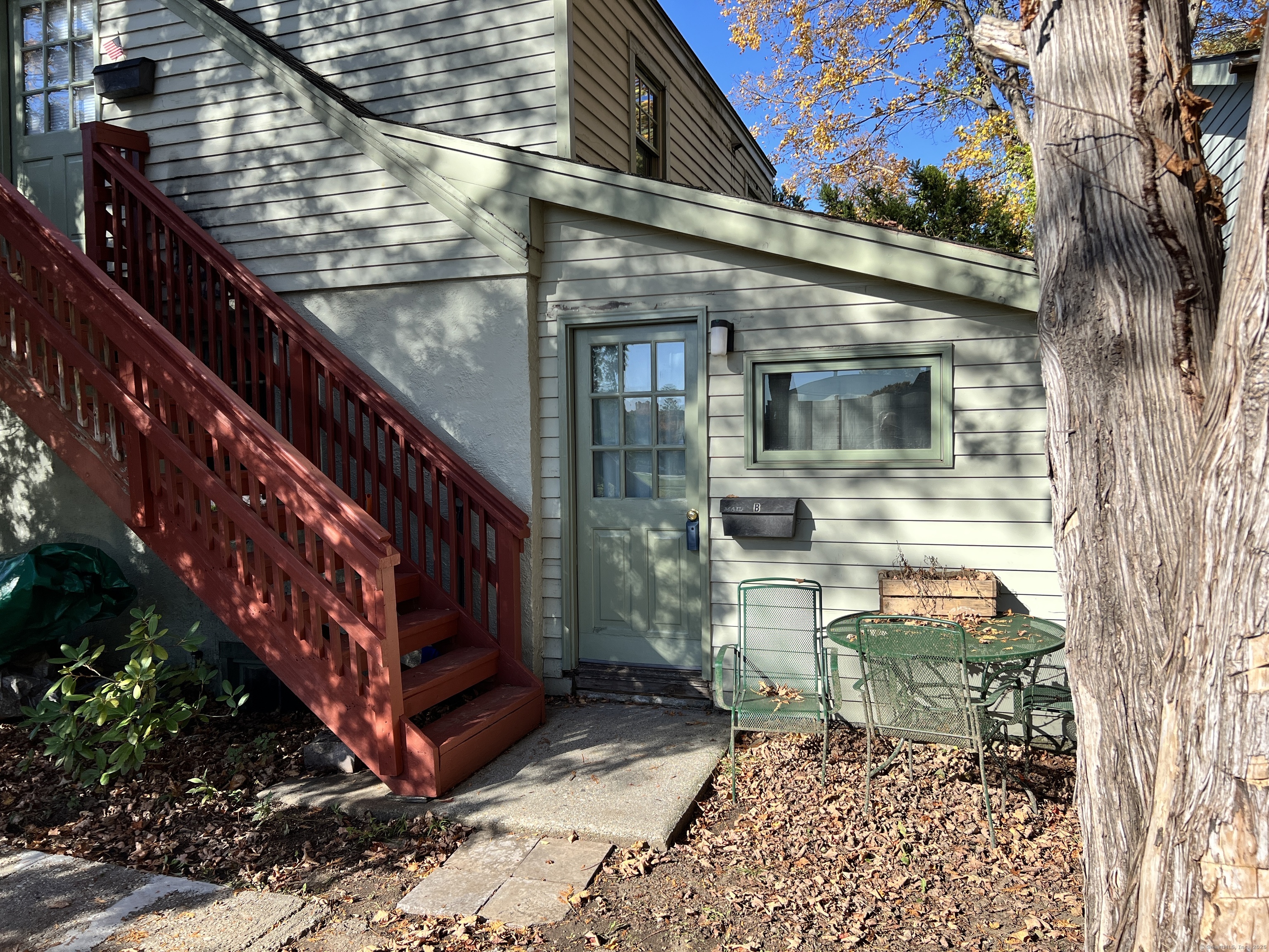 a view of a porch with a bench