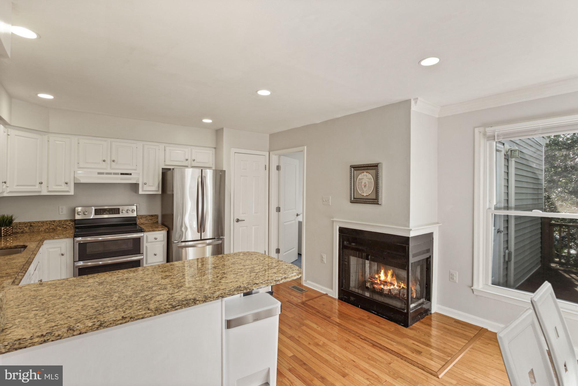 1106 Arcola Avenue Silver Spring, MD 20902 - Photo 13 of 33 Fire place in kitchen