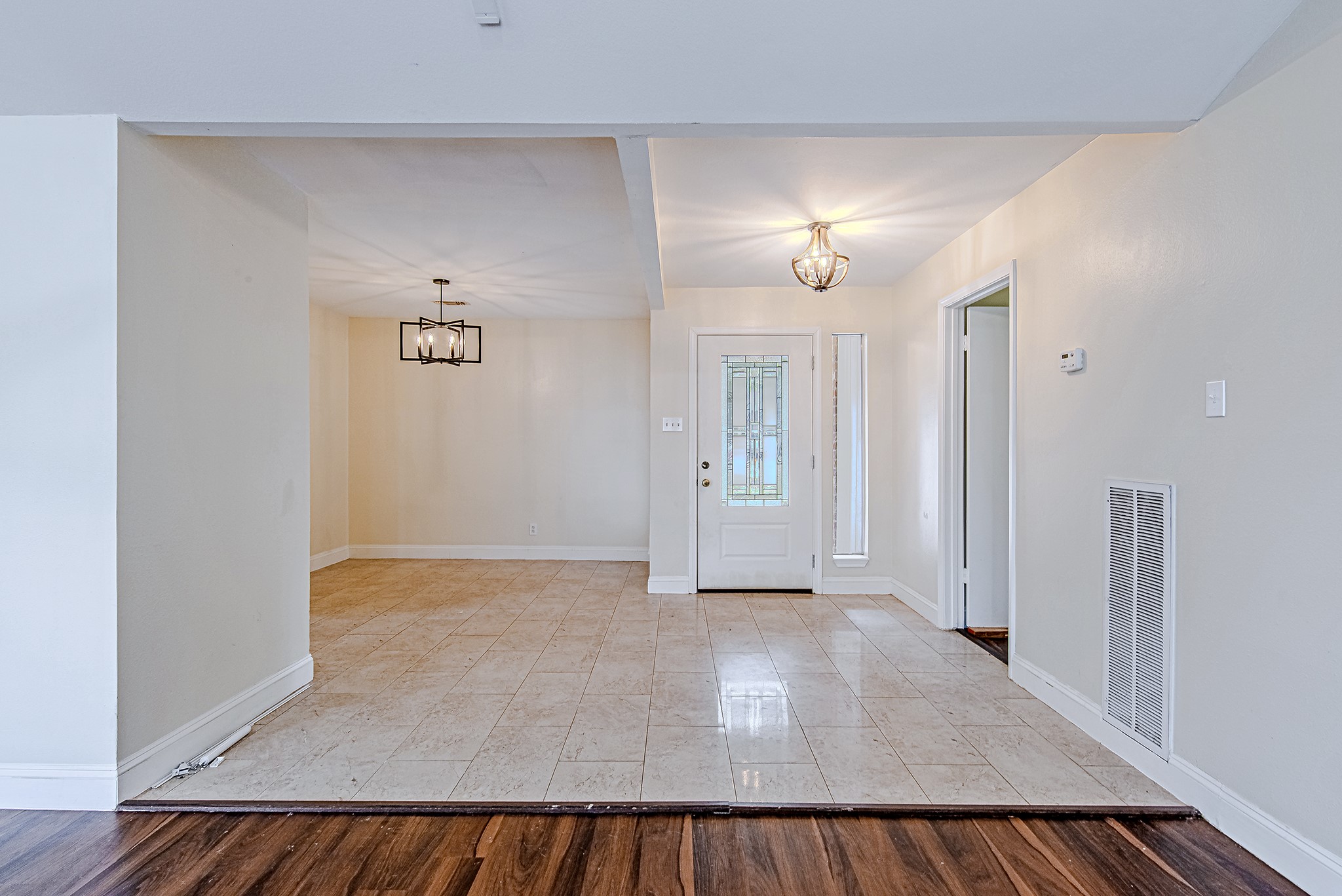17811 Hawk Haven Lane Spring, TX 77379 - Photo 5 of 22 Light-filled dining space with high ceilings and elegant simplicity, ideal for both casual dining and entertaining.