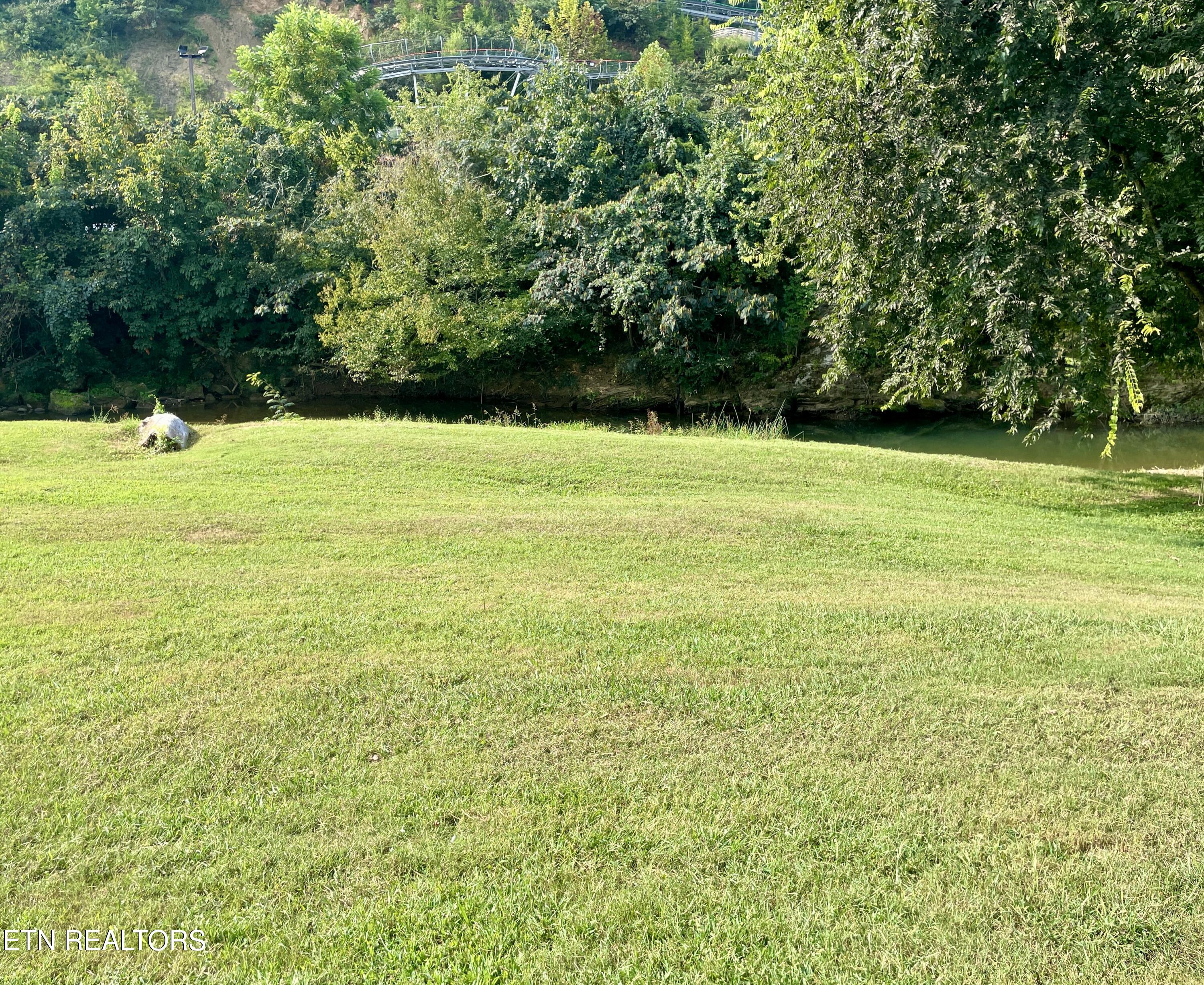 3208 Pebblebrook Way Pigeon Forge, TN 37862 - Photo 11 of 21 Beach creek view from rear of camper