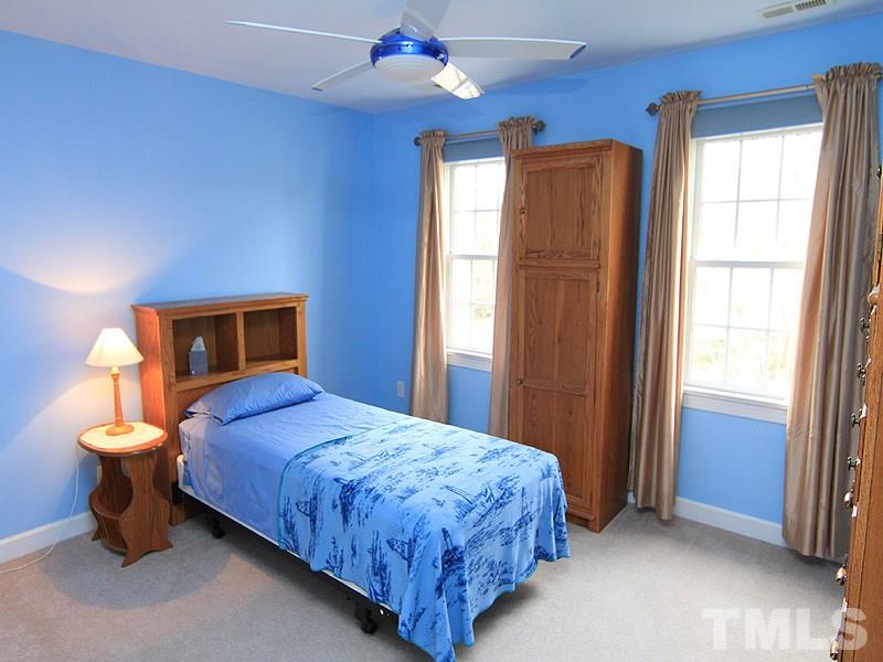 8209 Eden Close Court Raleigh, NC 27613 - Photo 12 of 20 Additional bedrooms are spacious with nice closet space.