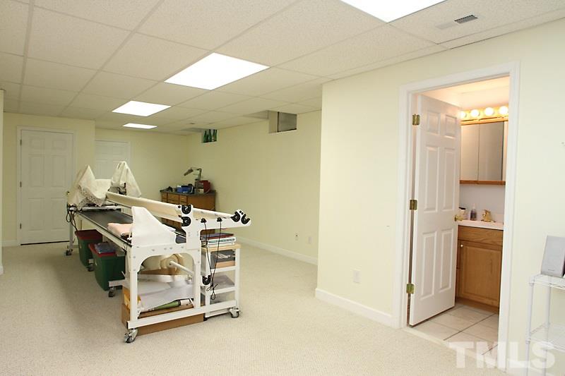 8209 Eden Close Court Raleigh, NC 27613 - Photo 16 of 20 Very large with 1/2 bathroom and two separate work rooms.
