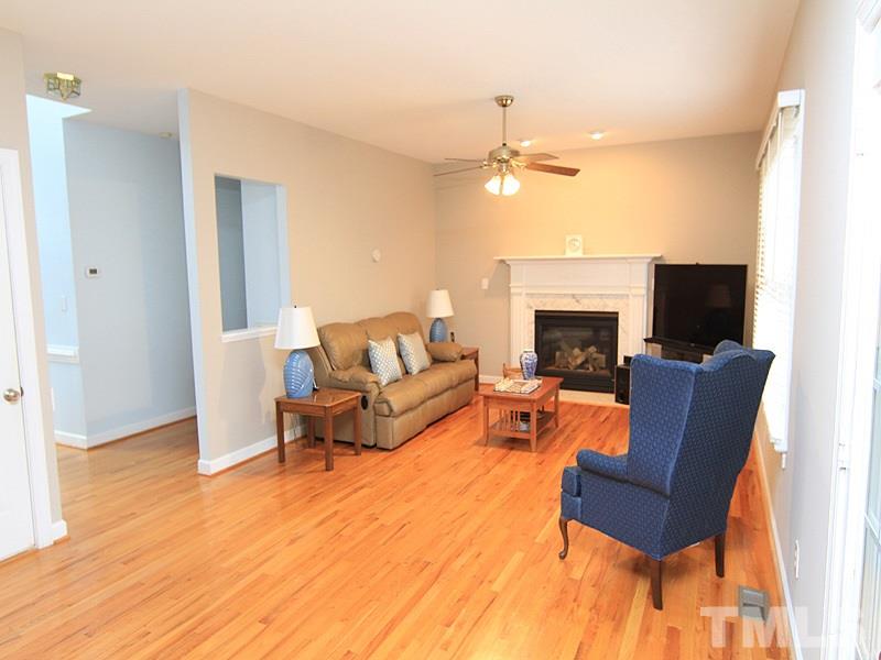 8209 Eden Close Court Raleigh, NC 27613 - Photo 6 of 20 Open space. Fireplace has beautiful marble surround.
