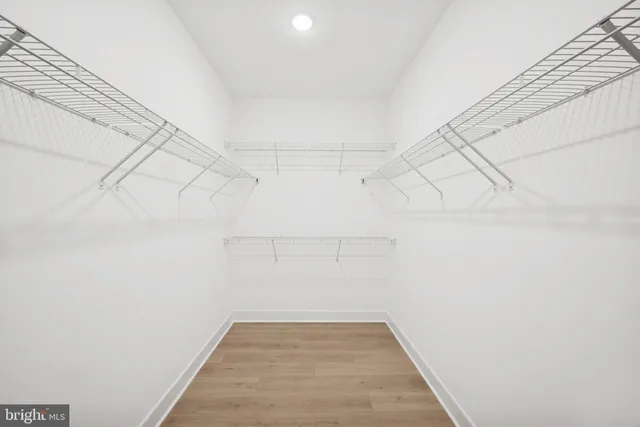 a view of a room with racks on the wall