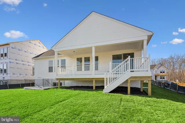 a view of a balcony with wooden floor