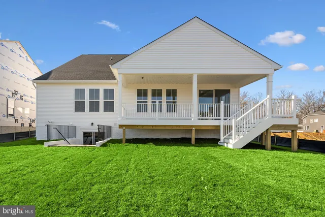 a front view of house with yard