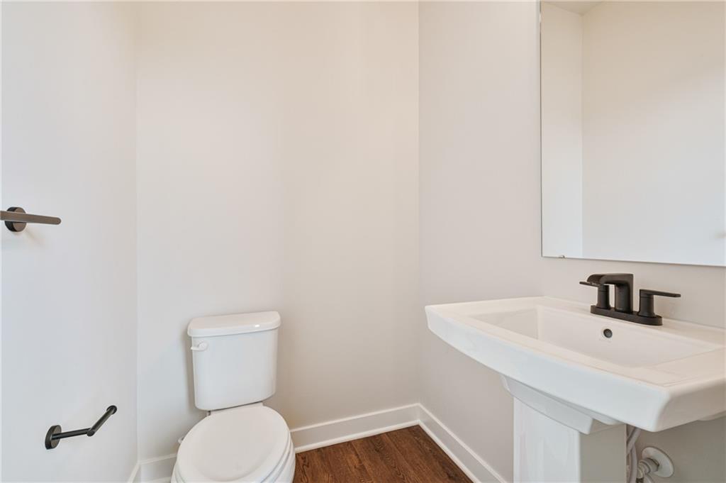 108 Scenic Ridge Drive Venetia, PA 15367 - Photo 13 of 32 a bathroom with a sink a toilet and a mirror